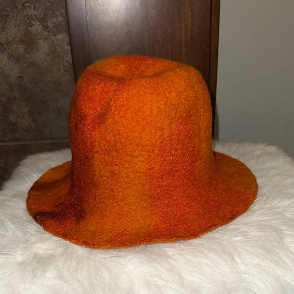 Camilla Krueger Designs orange marbled artisan hand-felted wool sculptural hat